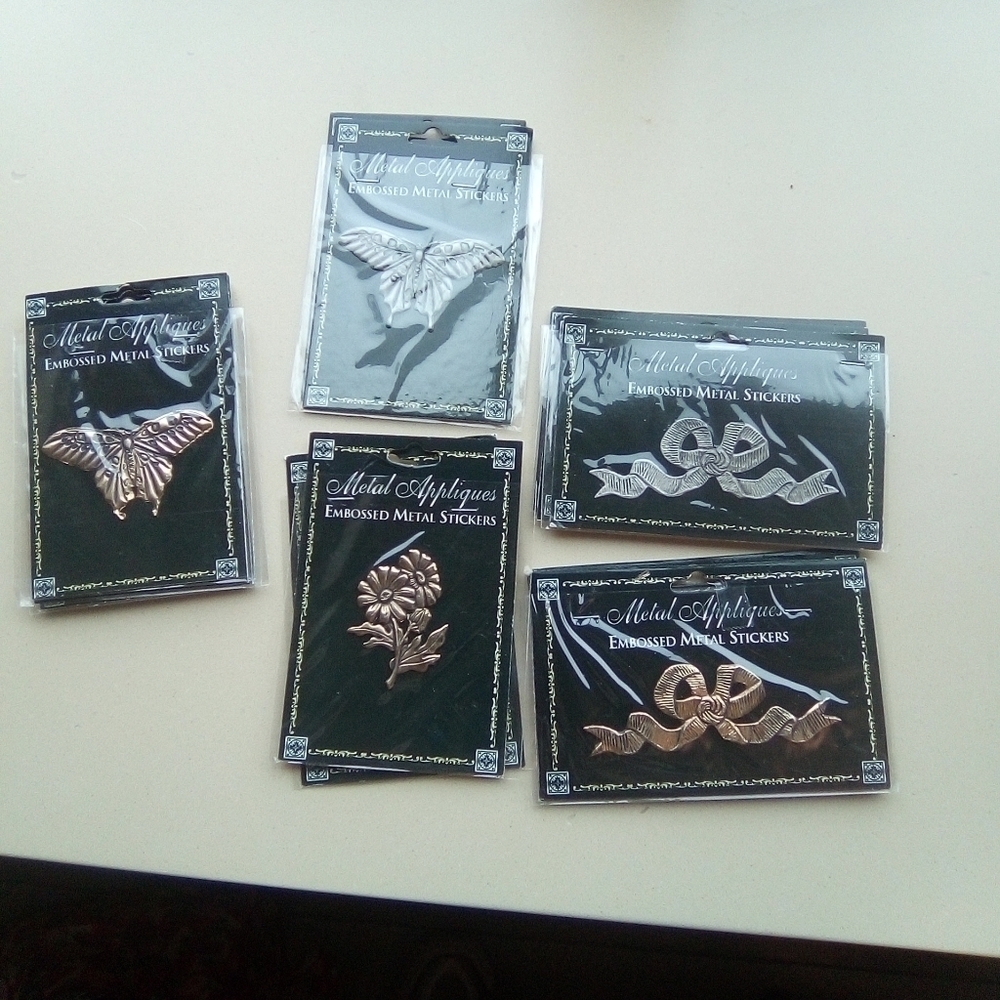 Metal embossed stickers. 15 total. NWOT.